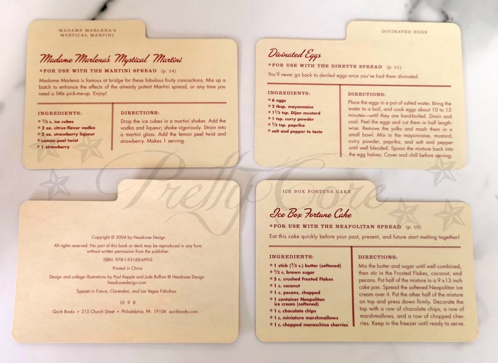 Housewives tarot recipe cards which are kitsch and cute in cream with red writing