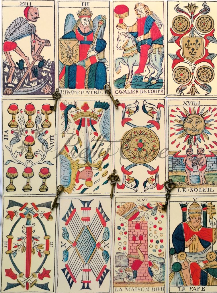 Tarot De Marseille - An 15th century tarot deck cream and primary colours in an old French style drawing