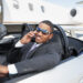 Man in a Convertible on the phone purchasing a new car