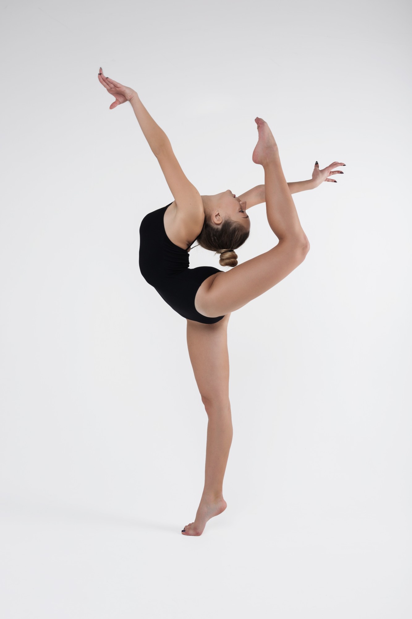 Young woman doing gymnastics
