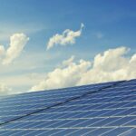Loads of garden solar panels and the sky behind them