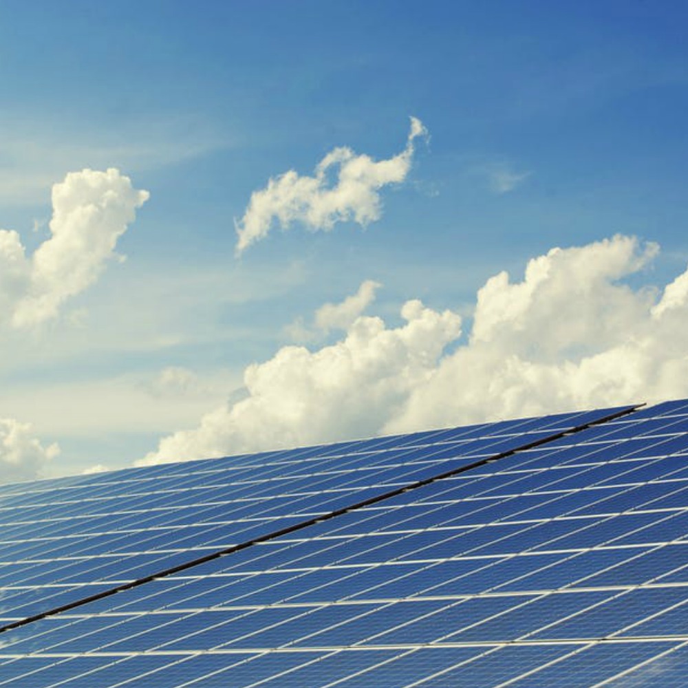 Loads of garden solar panels and the sky behind them