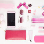 Beauty Trends for 2021 showing pink beauty items such as sunglasses, phone cases and accessories, flowers and makeup