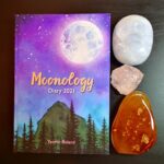 Moonology Diary 2021 showing the front of the book with crystals next to it