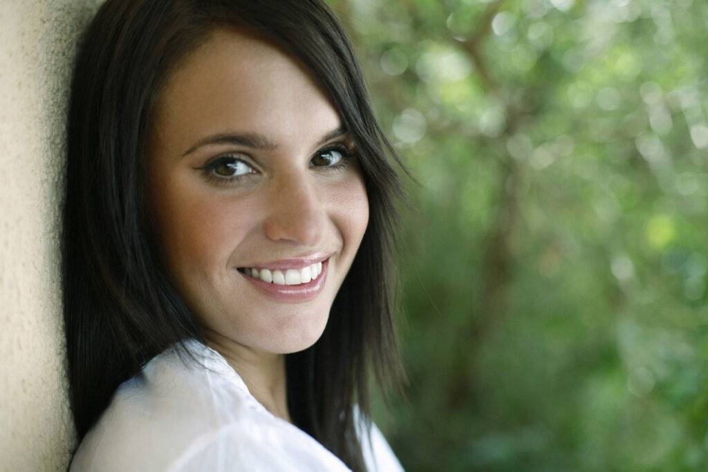 Woman smiling with clear skin