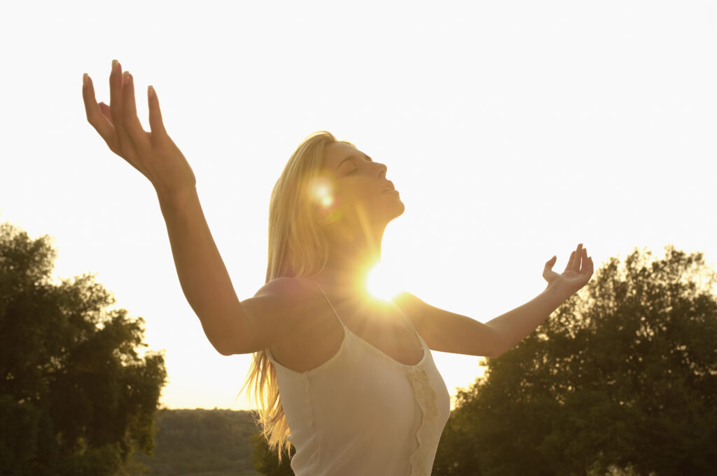 Woman practicing yoga and meditation as Feel Better About Yourself