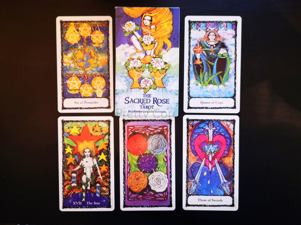 The Sacred Rose Tarot showing the cards and packaging in bright, beautiful colours