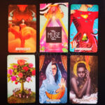 The Muse Tarot showing the cards and guide book